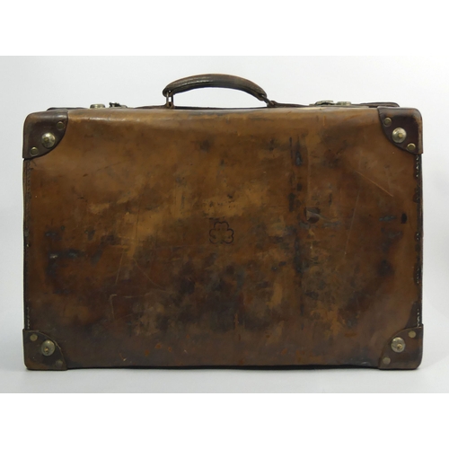 265 - An old leather suitcase 60 x 37 x 18 cm and a briefcase. Collection only.