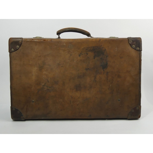 265 - An old leather suitcase 60 x 37 x 18 cm and a briefcase. Collection only.