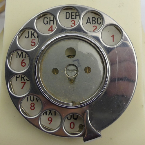 267 - An ivory colour bakelite G.P.O telephone 332F, with a drawer. UK Postage £15.