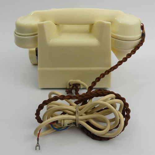 267 - An ivory colour bakelite G.P.O telephone 332F, with a drawer. UK Postage £15.