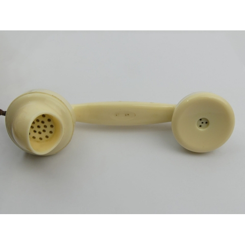 267 - An ivory colour bakelite G.P.O telephone 332F, with a drawer. UK Postage £15.