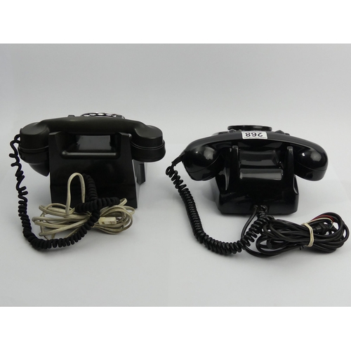 268 - A black bakelite G.E.C. telephone and a black plastic example. UK Postage £18.