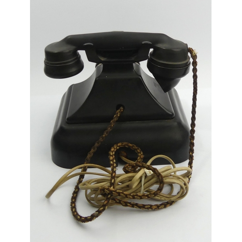 269 - Unusual black bakelite telephone with extension diverting call function. UK Postage £16.