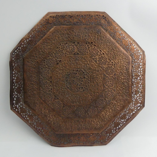 277 - A large Indian brass tray 58 cm and a decorative copper wall plate. Collection only.