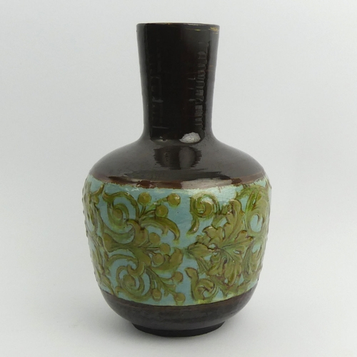 297 - A Doulton Lambeth Impasto art pottery vase, Fannie J. Allen 1883. 23 cm. UK Postage £14.