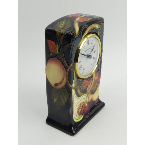 313 - Moorcroft art pottery Queens Choice design mantle clock. 16 cm. UK Postage £12.