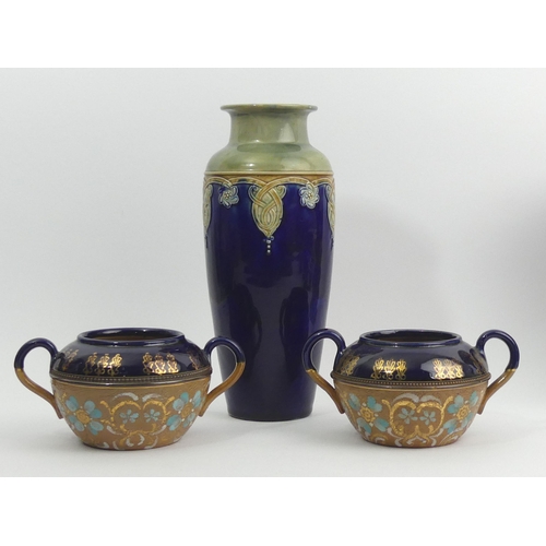 321 - Royal Doulton Lily Partington art pottery vase and two twin handled Doulton bowls. Vase 25 cm. UK Po... 