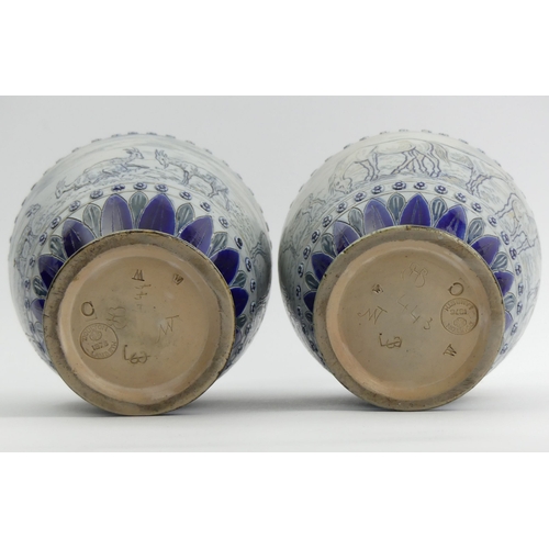 324 - A pair of Doulton Lambeth Hannah Barlow art pottery vases, decorated with a sgraffito design of hors... 