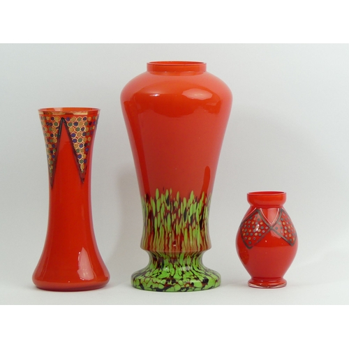 331 - Three Bohemian red art glass vases, largest 28 cm. UK Postage £16.