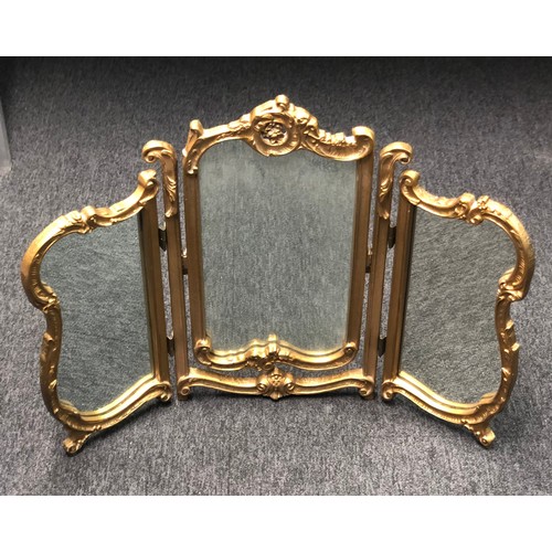 400 - A vintage gilt framed tryptich dressing table mirror. 58 cm high. Postage not available.