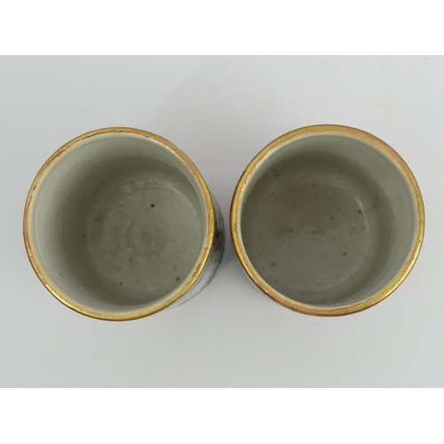 283 - A pair of Chinese Canton porcelain famille rose palette brush pots, 19th century. 11 x 6.5 cm. UK Po... 