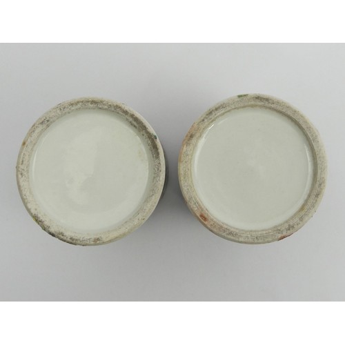 283 - A pair of Chinese Canton porcelain famille rose palette brush pots, 19th century. 11 x 6.5 cm. UK Po... 