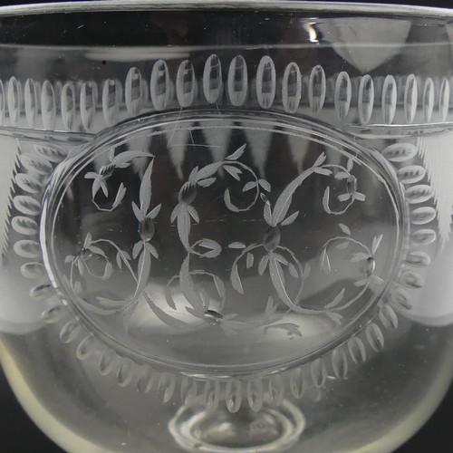 334 - Large Victorian engraved English hand blown glass goblet. 15.8 x 11 cm. UK Postage £12.