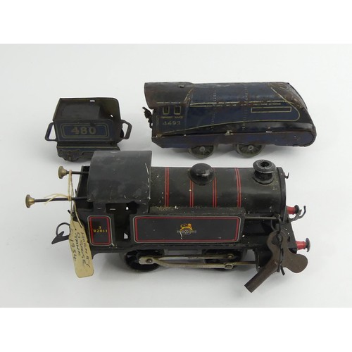 376 - Two O guage locomotive model clock work trains. UK Postage £12.