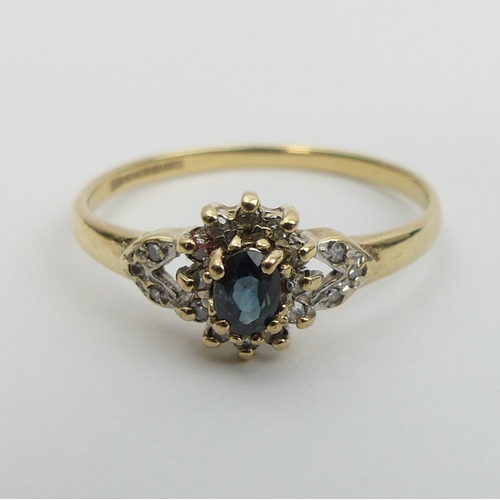 10 - 9ct gold sapphire and diamond ring, 1.7 grams. Size U, 8.8 mm wide. UK Postage £12.
