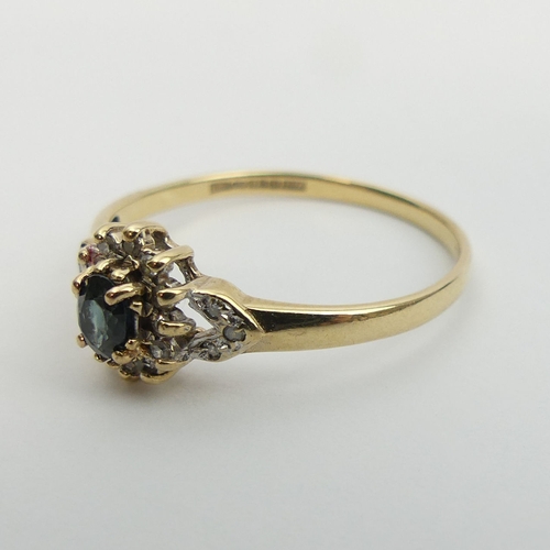 10 - 9ct gold sapphire and diamond ring, 1.7 grams. Size U, 8.8 mm wide. UK Postage £12.