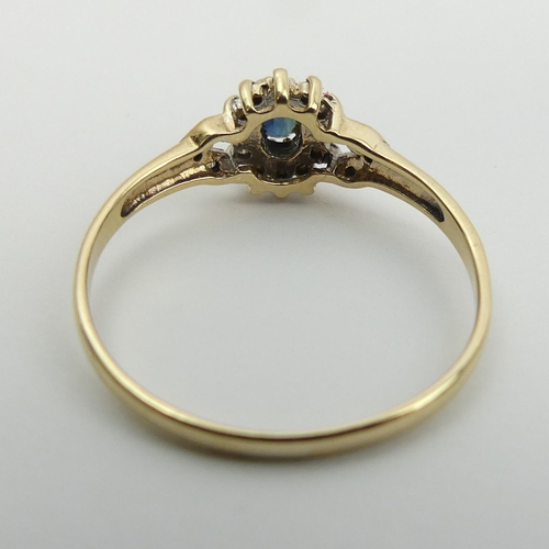 10 - 9ct gold sapphire and diamond ring, 1.7 grams. Size U, 8.8 mm wide. UK Postage £12.