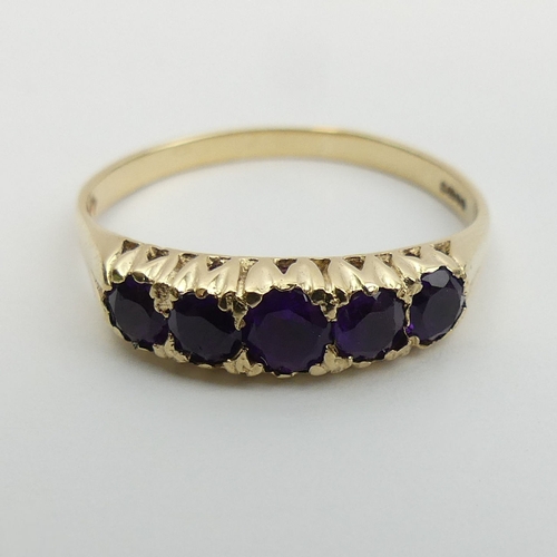 12 - 9ct gold amethyst five stone ring, 2.4 grams. Size U, 5.2 mm wide. UK Postage £12.