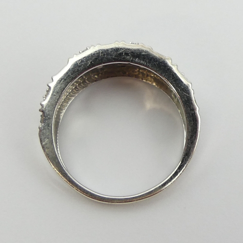 13 - 9ct gold black and white diamond set ring, 4.1 grams. Size N, 9 mm wide. UK Postage £12.