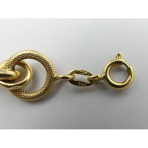 14 - 9ct gold textured and plain ring design bracelet, 14.2 grams. 20 cm x 11 mm. UK Postage £12.