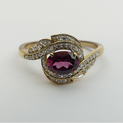 15 - 9ct gold rhodolite and white zircon ring, 3 grams. Size S. UK Postage £12.