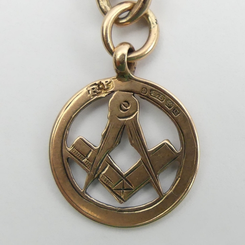 20A - 9ct rose gold double-clip curb link pocket watch Albert chain, with a Masonic fob, 
Birm. 1919, 52.4... 