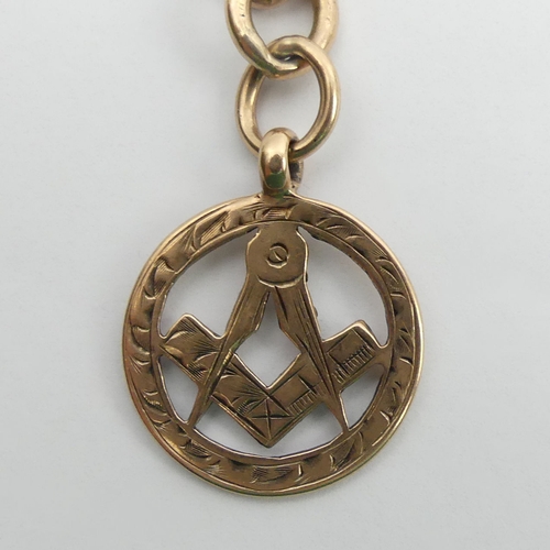 20A - 9ct rose gold double-clip curb link pocket watch Albert chain, with a Masonic fob, 
Birm. 1919, 52.4... 