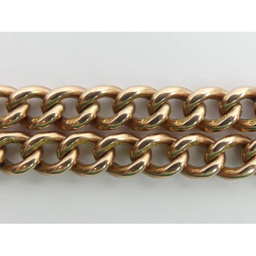 20A - 9ct rose gold double-clip curb link pocket watch Albert chain, with a Masonic fob, 
Birm. 1919, 52.4... 