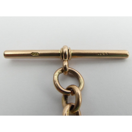 20A - 9ct rose gold double-clip curb link pocket watch Albert chain, with a Masonic fob, 
Birm. 1919, 52.4... 