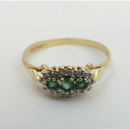23 - 9ct gold emerald and diamond ring, 1.4 grams. Size P, 6.4 mm wide. UK Postage £12.