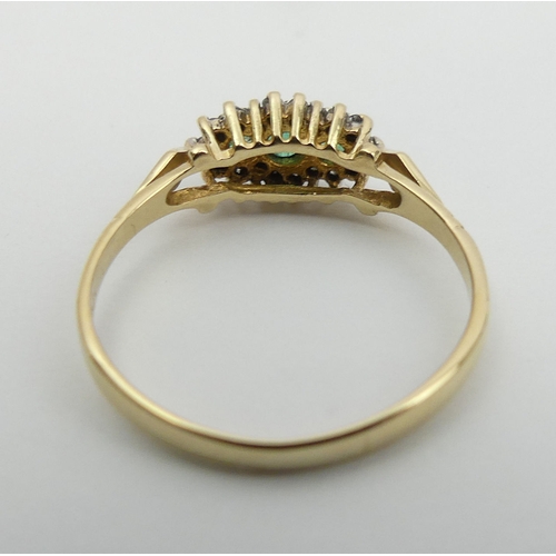 23 - 9ct gold emerald and diamond ring, 1.4 grams. Size P, 6.4 mm wide. UK Postage £12.