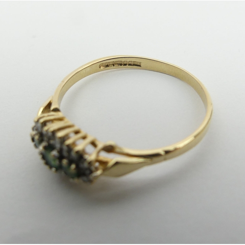 23 - 9ct gold emerald and diamond ring, 1.4 grams. Size P, 6.4 mm wide. UK Postage £12.