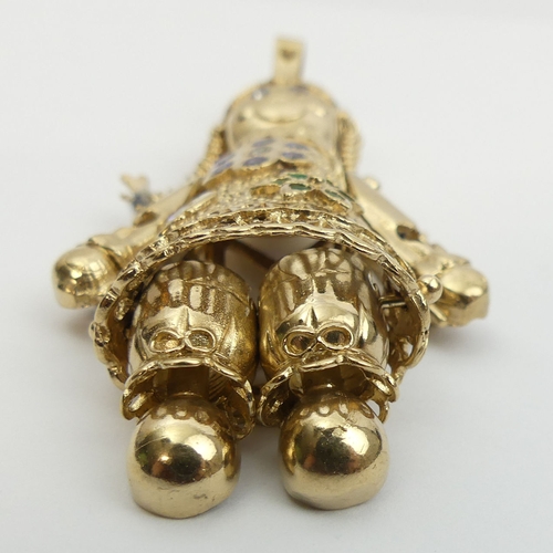 4 - 9ct gold stone set articulated rag doll pendant, 30 grams. 76 mm long. UK Postage £12.
