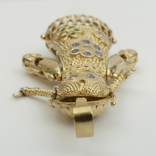 4 - 9ct gold stone set articulated rag doll pendant, 30 grams. 76 mm long. UK Postage £12.