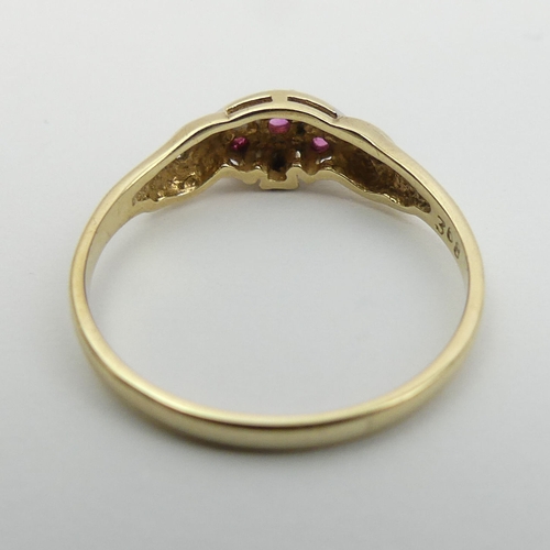 8 - 9ct gold ruby and diamond ring. Size P 1/2, 6 mm. UK Postage £12.