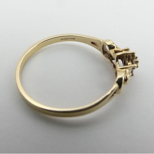 9 - 9ct gold seven stone diamond ring. Size Q 1/2, 6 mm wide. UK Postage £12.