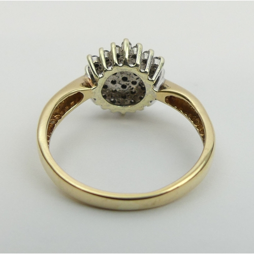 25 - 9ct gold diamond cluster ring, 3.1 grams, size O 11.3mm wide.  UK Postage £12.