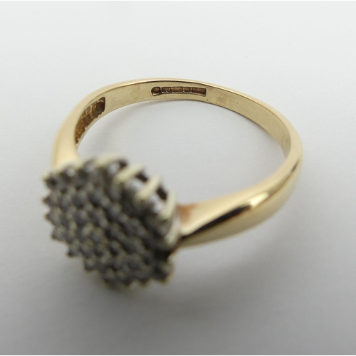 25 - 9ct gold diamond cluster ring, 3.1 grams, size O 11.3mm wide.  UK Postage £12.