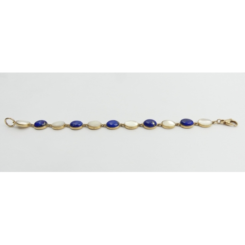 26 - 9ct gold lapis and moonstone cabochon bracelet, 10 grams, 17.5cm x 8.8mm. Postage £12