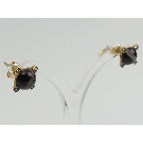 28 - A pair of gold banded agate and diamond earrings, 
2.4 grams, 9mm long.  UK Postage £12.