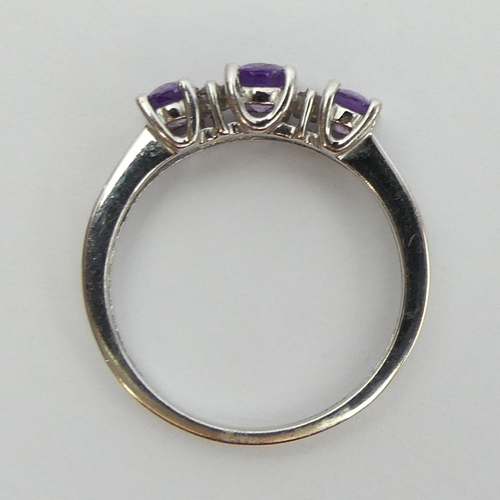 29 - 9ct white gold purple sapphire and diamond ring, 
2.3 grams, size N 5.2mm wide.  UK Postage £12.