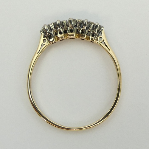 37 - 18ct gold, five stone diamond ring, 2.2 grams, Size U
4mm wide.  UK Postage £12.