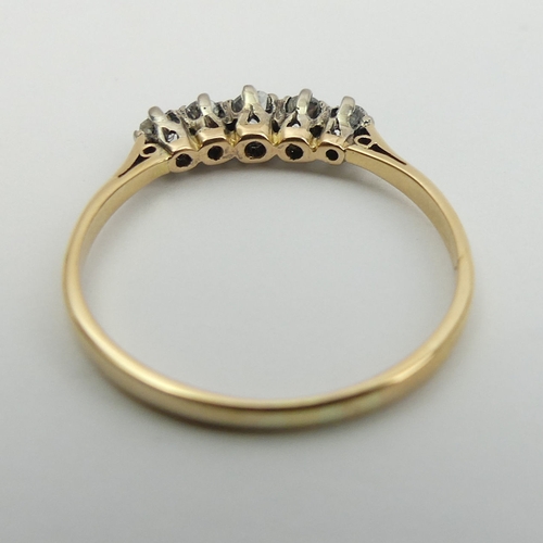 37 - 18ct gold, five stone diamond ring, 2.2 grams, Size U
4mm wide.  UK Postage £12.