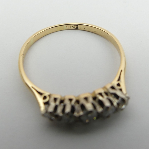 37 - 18ct gold, five stone diamond ring, 2.2 grams, Size U
4mm wide.  UK Postage £12.