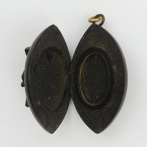 39 - Victorian vulcanite locket pendant, 13.5 grams, 50mm long,
 UK Postage £12.