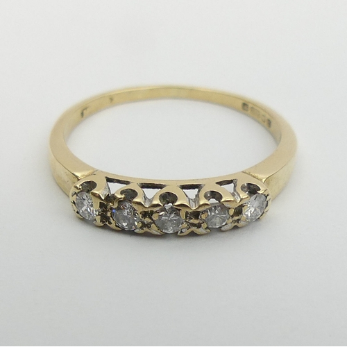 41 - 9ct gold five stone diamond ring, 1.3 grams, Size J, 2.8mm. UK Postage £12.