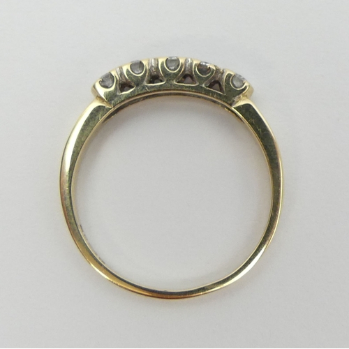 41 - 9ct gold five stone diamond ring, 1.3 grams, Size J, 2.8mm. UK Postage £12.