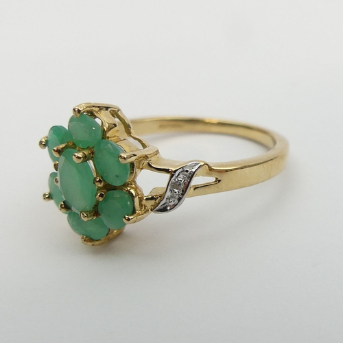 42 - 9ct gold emerald and diamond ring, 3 grams, Size R,          
13.2mm wide, UK Postage £12.