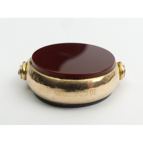 45 - 9ct gold carnelian and bloodstone swivel fob, Birm. 1894
9.5 grams, 35 x 28mm.  UK Postage £12.