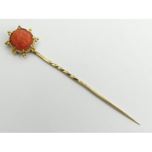 47 - Gold Victorian carved coral stick pin, 1.6 grams, 62mm wide. UK Postage £12.